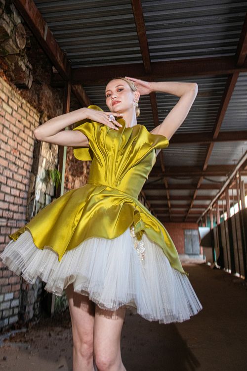 Yellow Cloth Model Fashion Model in Vibrant Yellow Dress in Urban Setting ยท Free Stock Photo