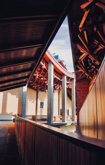 Captivating modern architecture featuring intricate wooden designs and open spaces.