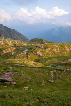 Beautiful alpine landscape in Glarus Süd, Switzerland showcasing lush greenery and distant peaks.