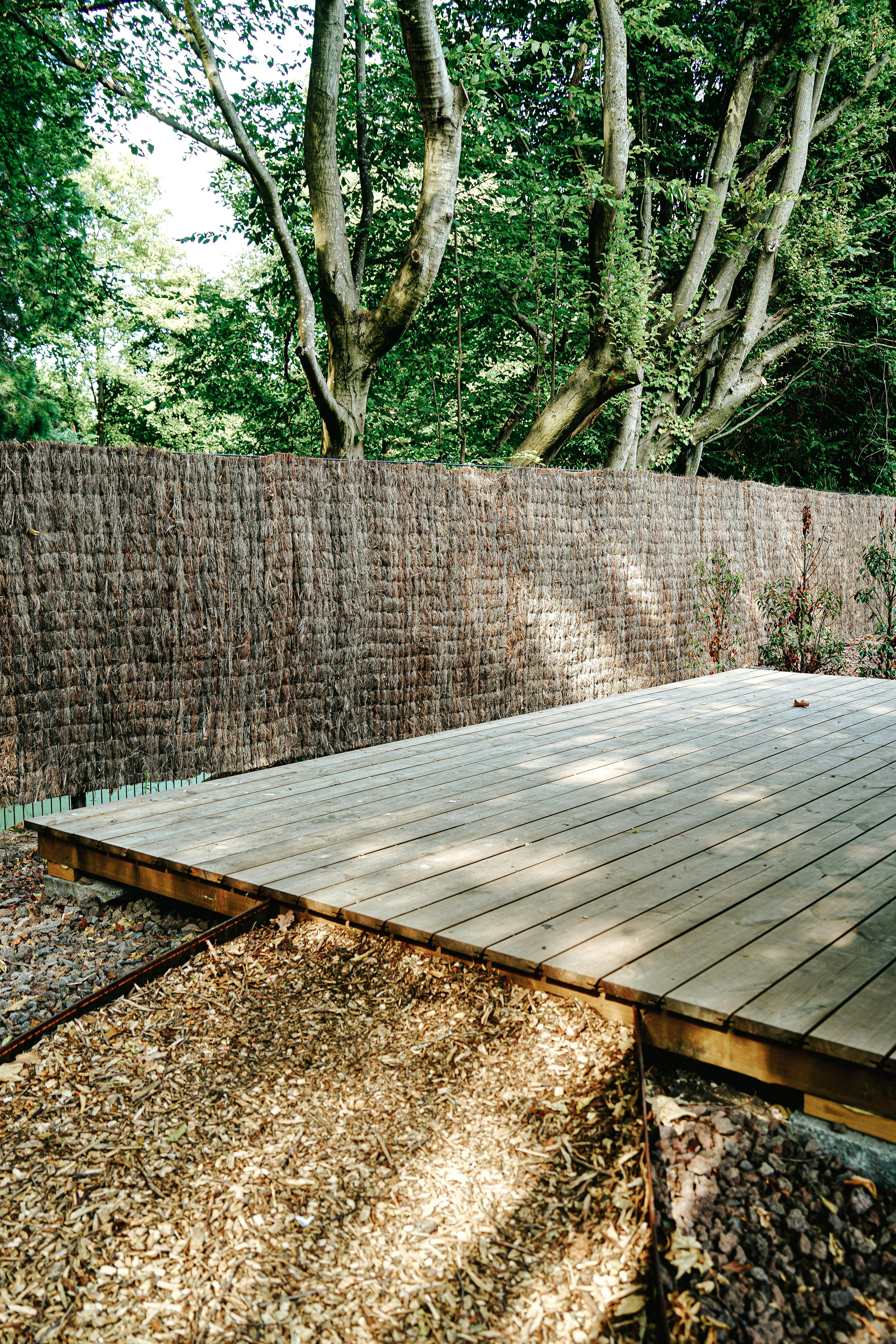 Bespoke composite decking and privacy fence in backyard