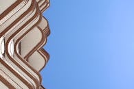 Modern Architectural Balcony Under Clear Blue Sky