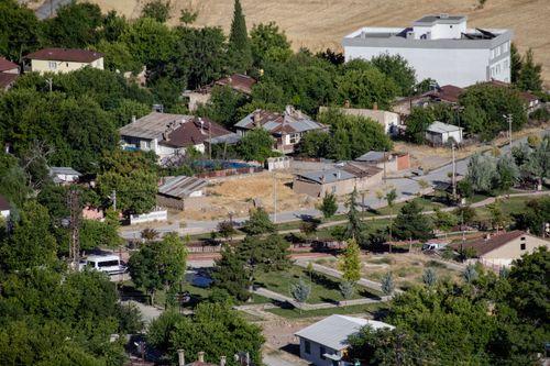 Free Aerial shot of a residential area in Elâzığ, Türkiye, showcasing lush greenery and urban architecture. Stock Photo