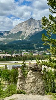 Panoramic view of mountains, trees, and rock formations in Banff.