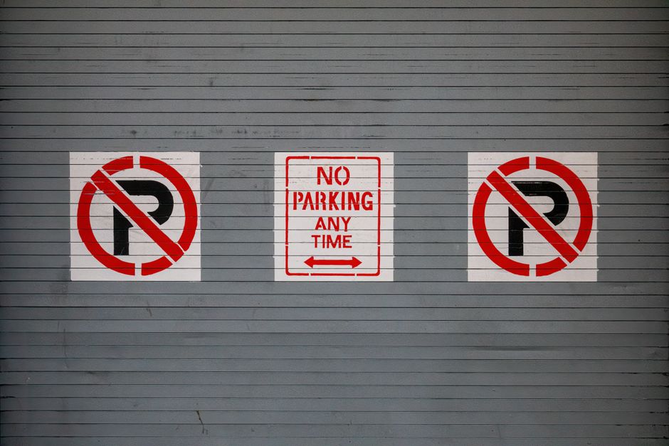 Road sign in UAE illustrating traffic laws and fines