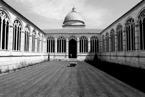 Grayscale Photo of a Dome Concrete Building