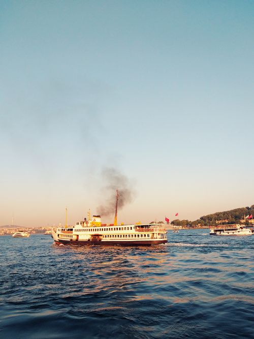 Free A picturesque ferry sailing on the Bosphorus in Istanbul, Türkiye, under a clear sky. Stock Photo