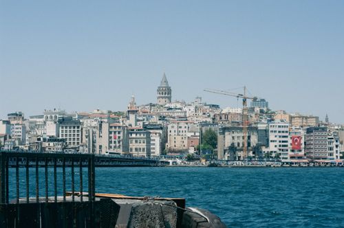 Free Panoramic view of Galata Tower rising above the bustling Istanbul skyline on a sunny day. Stock Photo