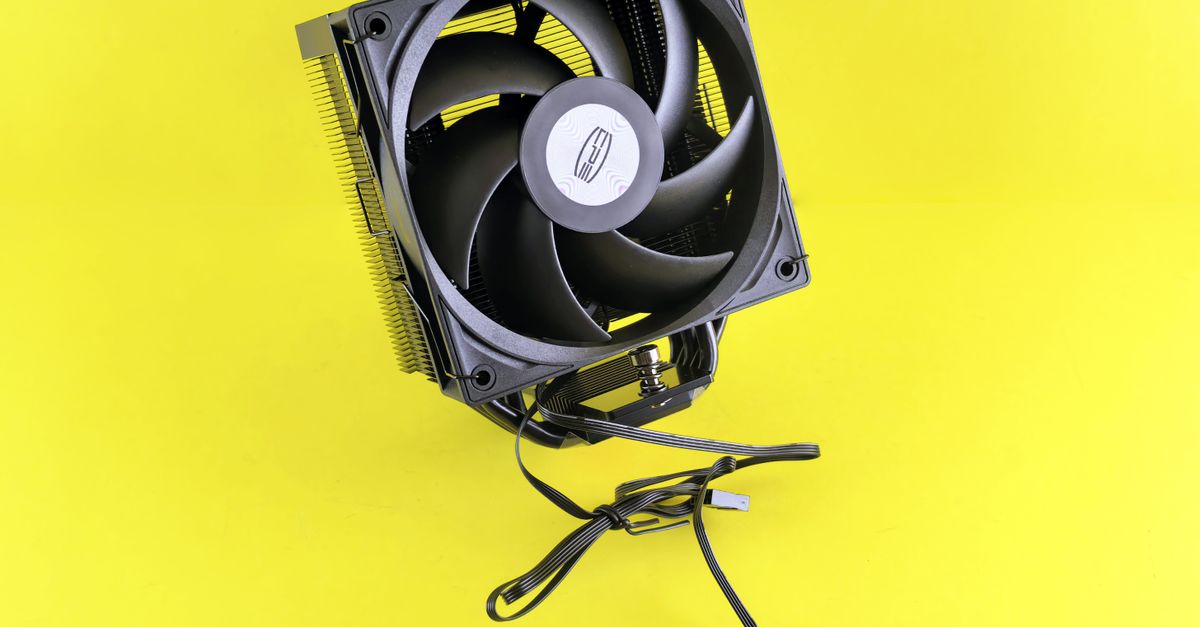 Computer Efficient Yellow Efficient CPU Cooler with Fan on Yellow Background · Free Stock Photo