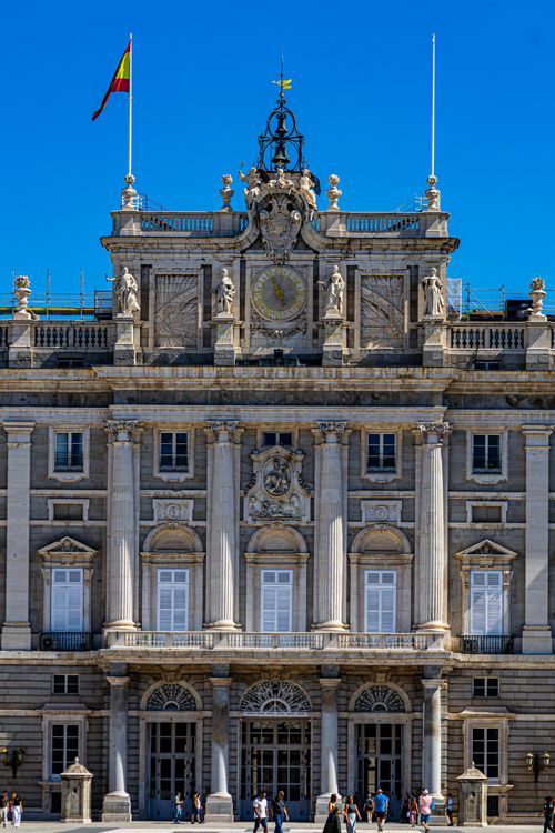 Free The stunning facade of the historic Royal Palace in Madrid, captured on a clear day. Stock Photo
