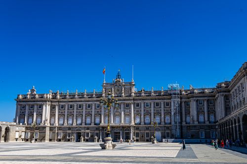 Free Stunning exterior of the Royal Palace in Madrid, captured on a clear summer day. Stock Photo