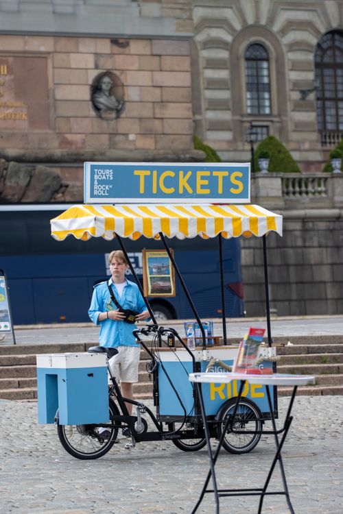 Free Outdoor tourist ticket booth with a vendor in Stockholm, Sweden. Stock Photo