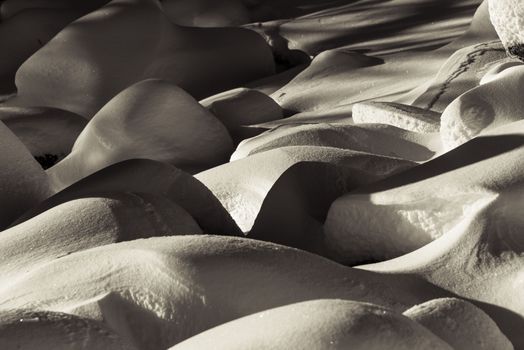 Beautiful abstract snow formations captured in Auvergne-Rhône-Alpes, France, during winter.