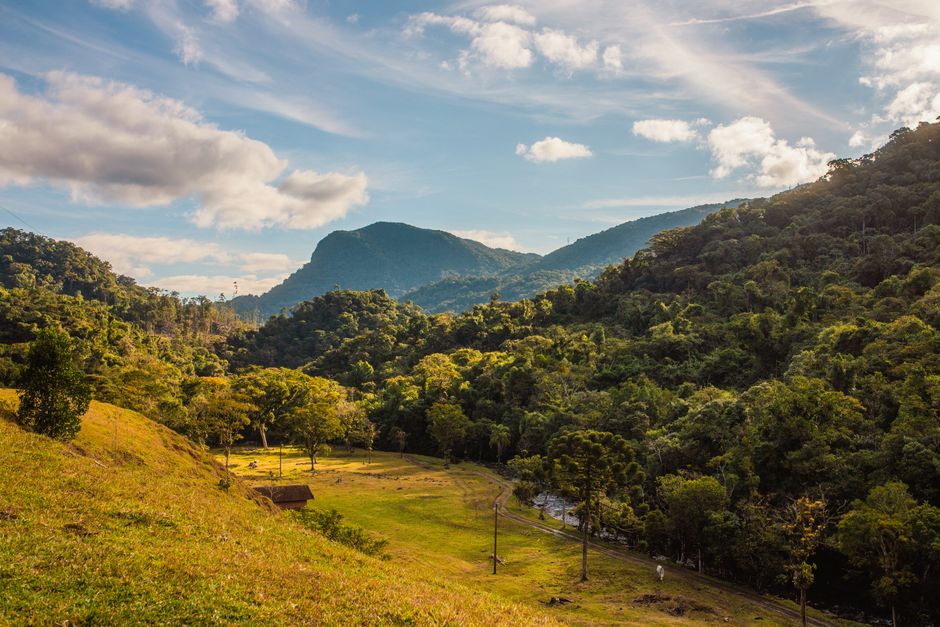 Best Petrópolis Teresópolis Trekking Expedition - 3 Days - PARNASO - Rio de Janeiro Review 2026 - Captivating view of lush green mountains under a bright blue sky, ideal for nature lovers.