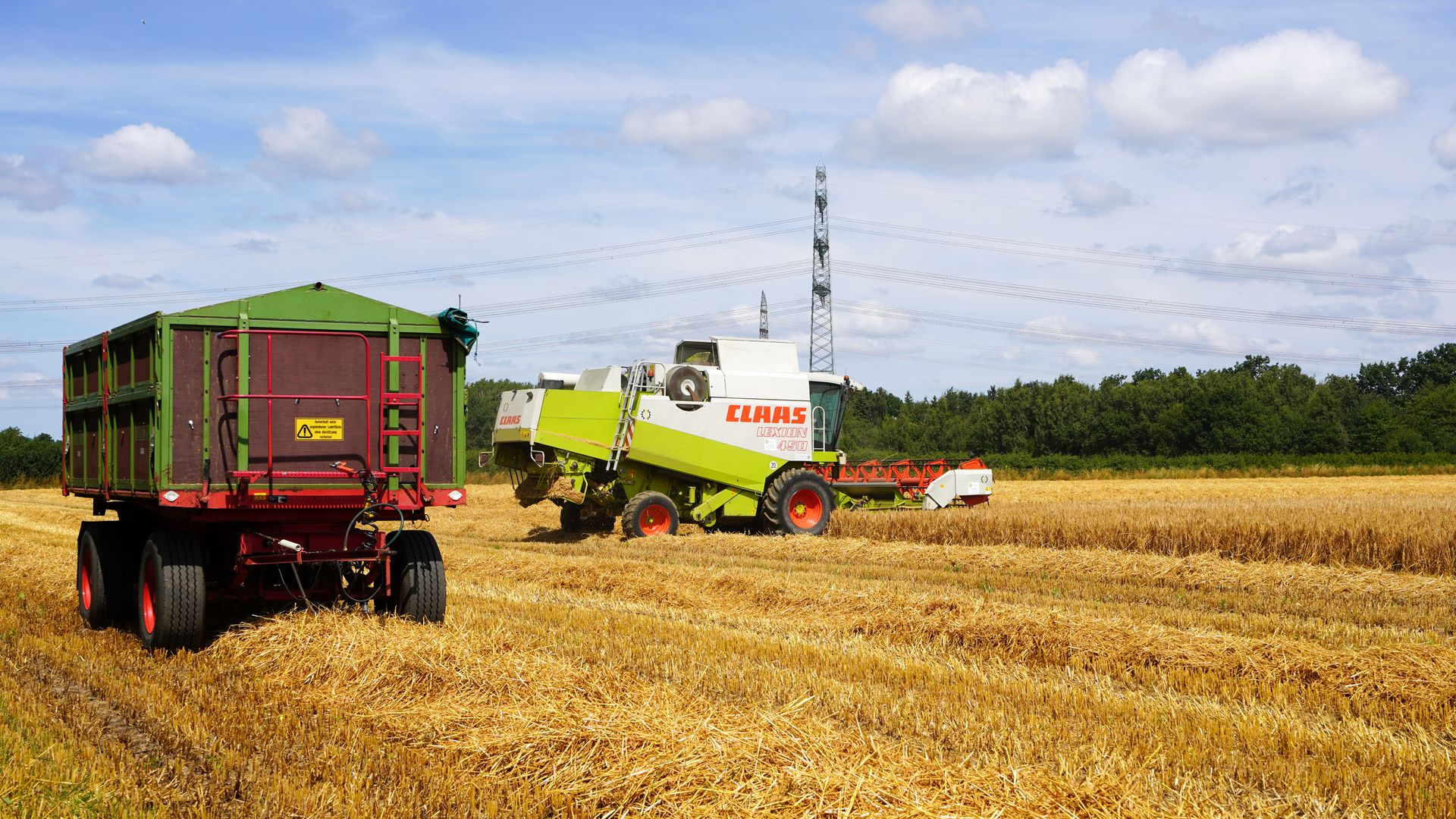 A combine harvester in action during harvest time in Geesthacht, Germany.