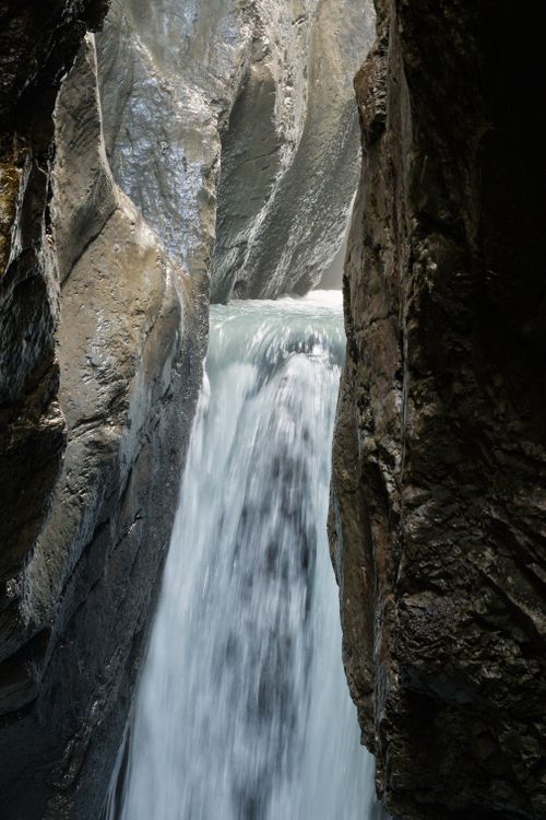 Free Stunning view of a waterfall cascading through Aare Gorge in Switzerland's Bernese Oberland. Stock Photo