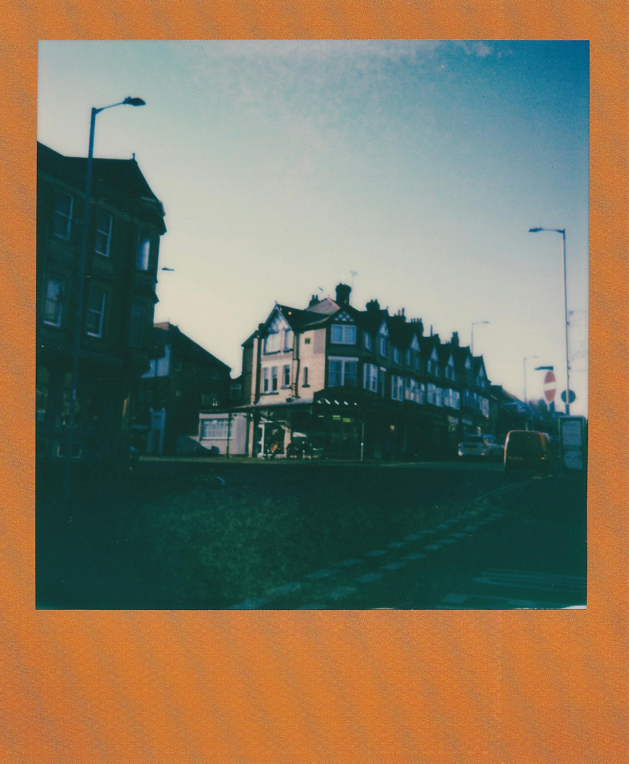Classic urban street scene in Rhos on Sea, Wales with vintage architecture.