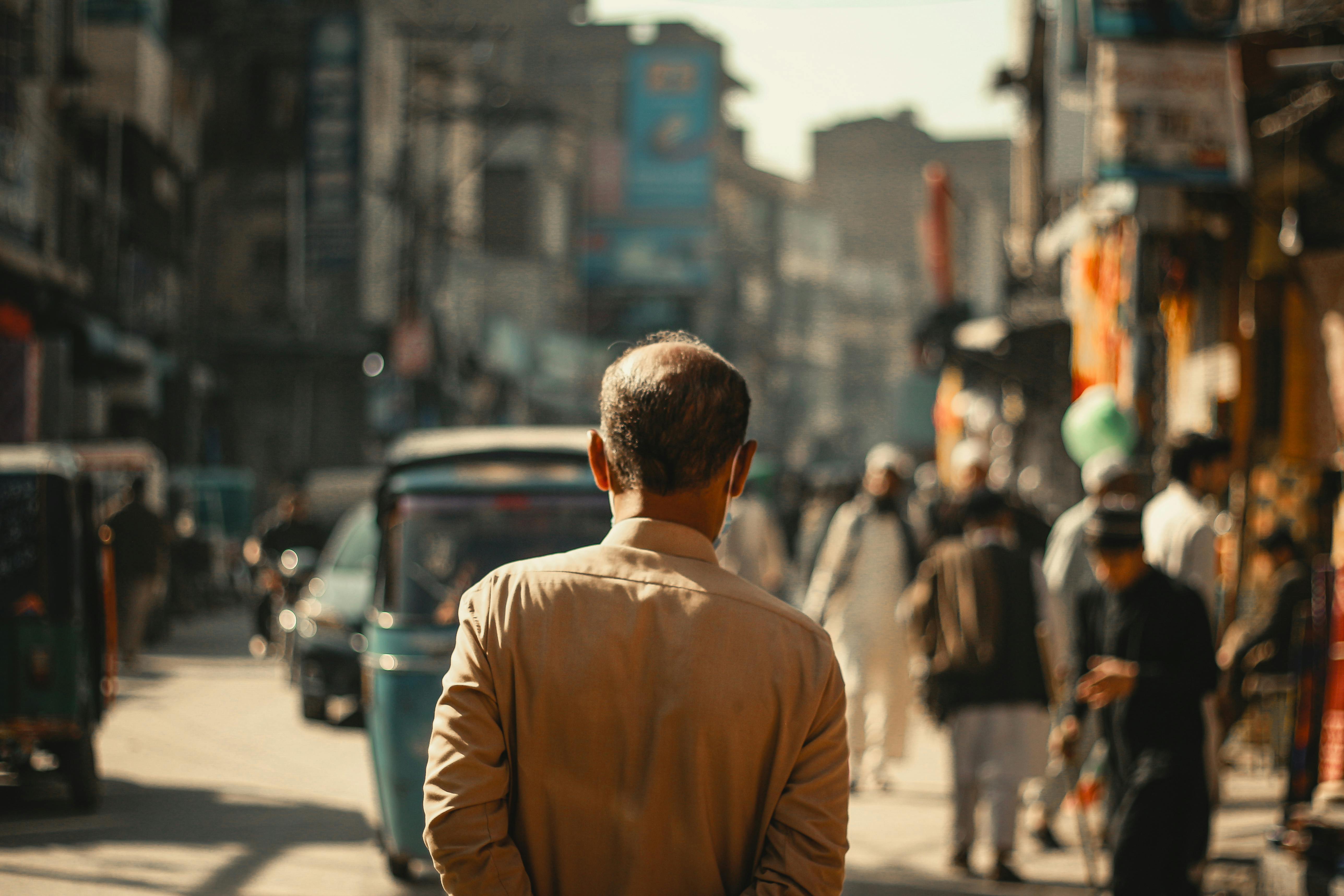 A busy street in Peshawar, Pakistan, showcasing local culture and daily life.