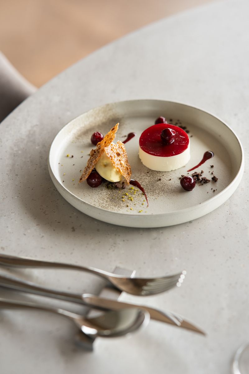 Elevated dessert presentation at a luxury café in Tokyo, featuring fine plating and artisanal style.