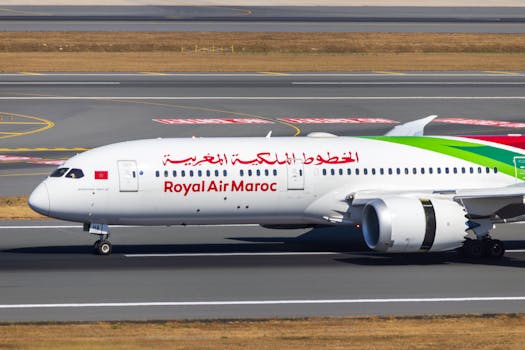 Royal Air Maroc airplane taxiing on the runway at İstanbul Airport, showcasing airline design.