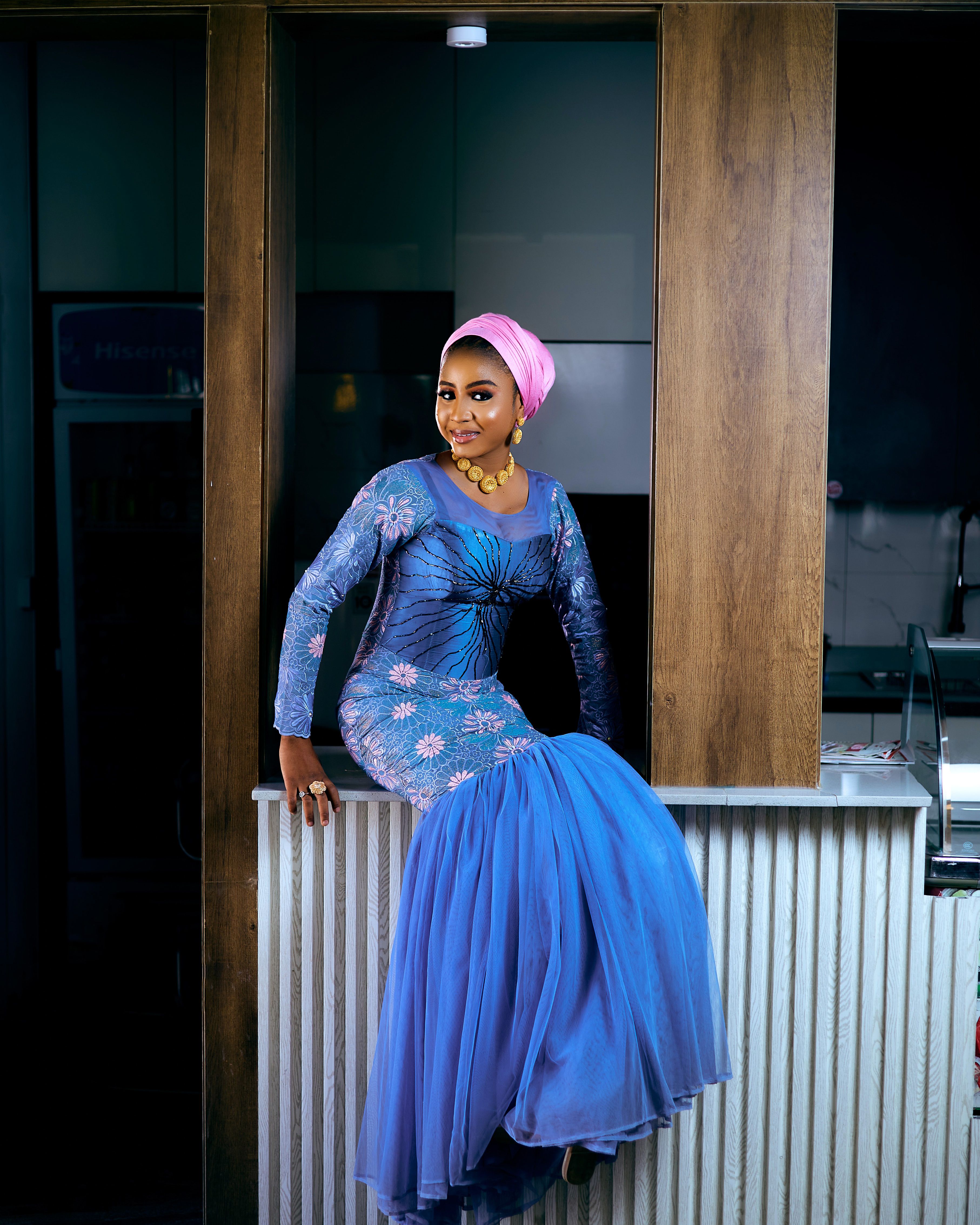 Elegant Woman in Blue Traditional Gown Indoors · Free Stock Photo