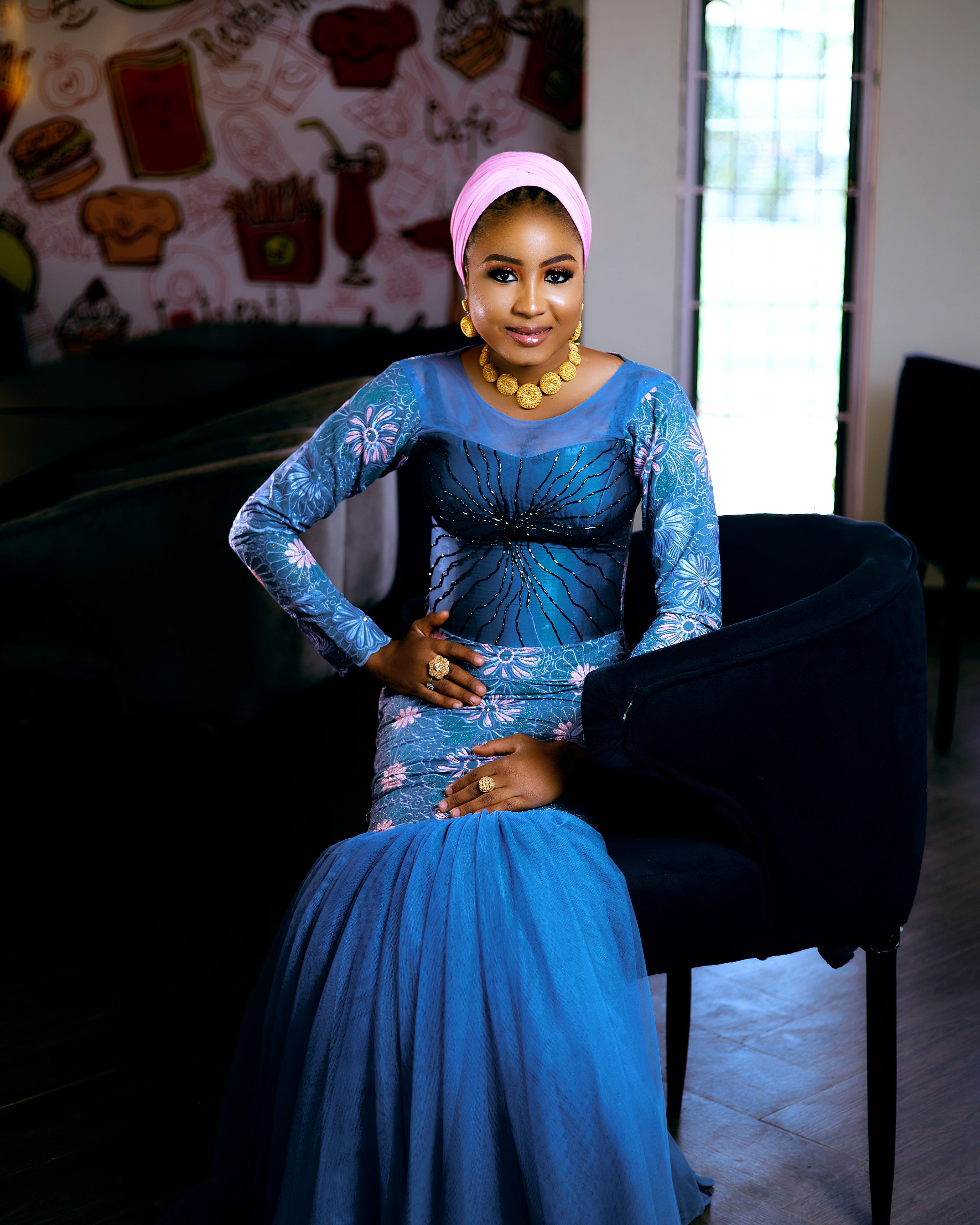 Elegant Woman in Traditional Blue Dress Indoors · Free Stock Photo