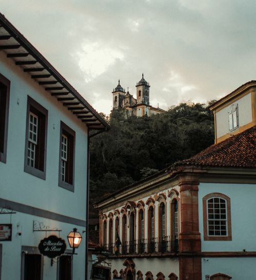 Free A beautiful view of a historic church on a hilltop in Ouro Preto, Brazil, at dusk with colonial architecture. Stock Photo