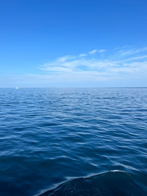Free Explore the tranquil open sea with a clear blue horizon in Phuket, Thailand. Perfect nautical scene. Stock Photo