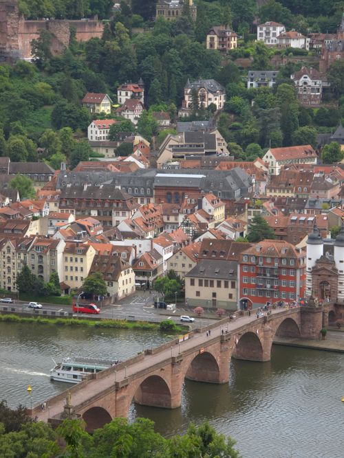 Free A picturesque view of Heidelberg's Old Bridge crossing the Neckar River with charming architecture. Stock Photo
