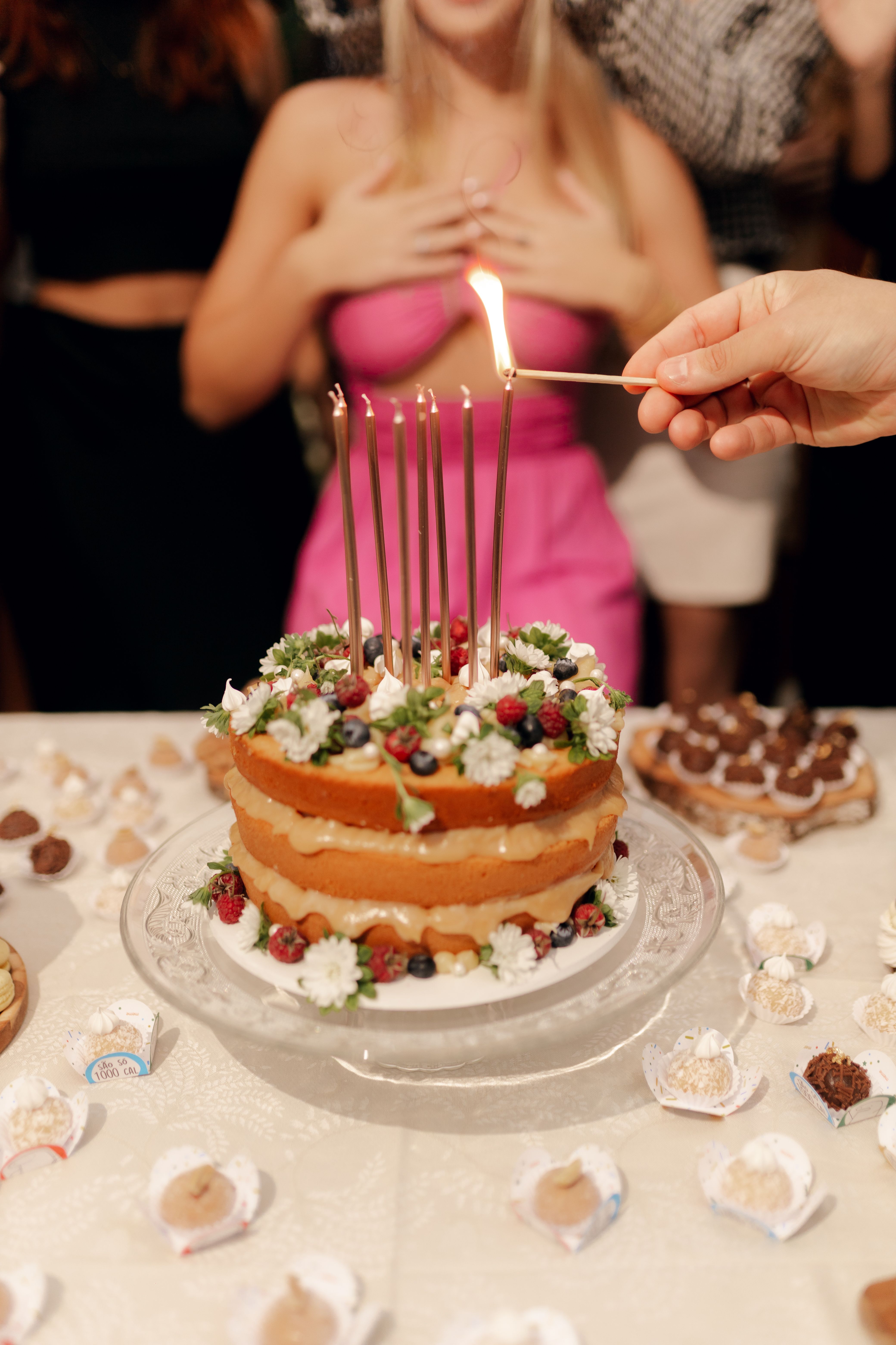 Birthday Celebration with Lit Candles on Cake · Free Stock Photo
