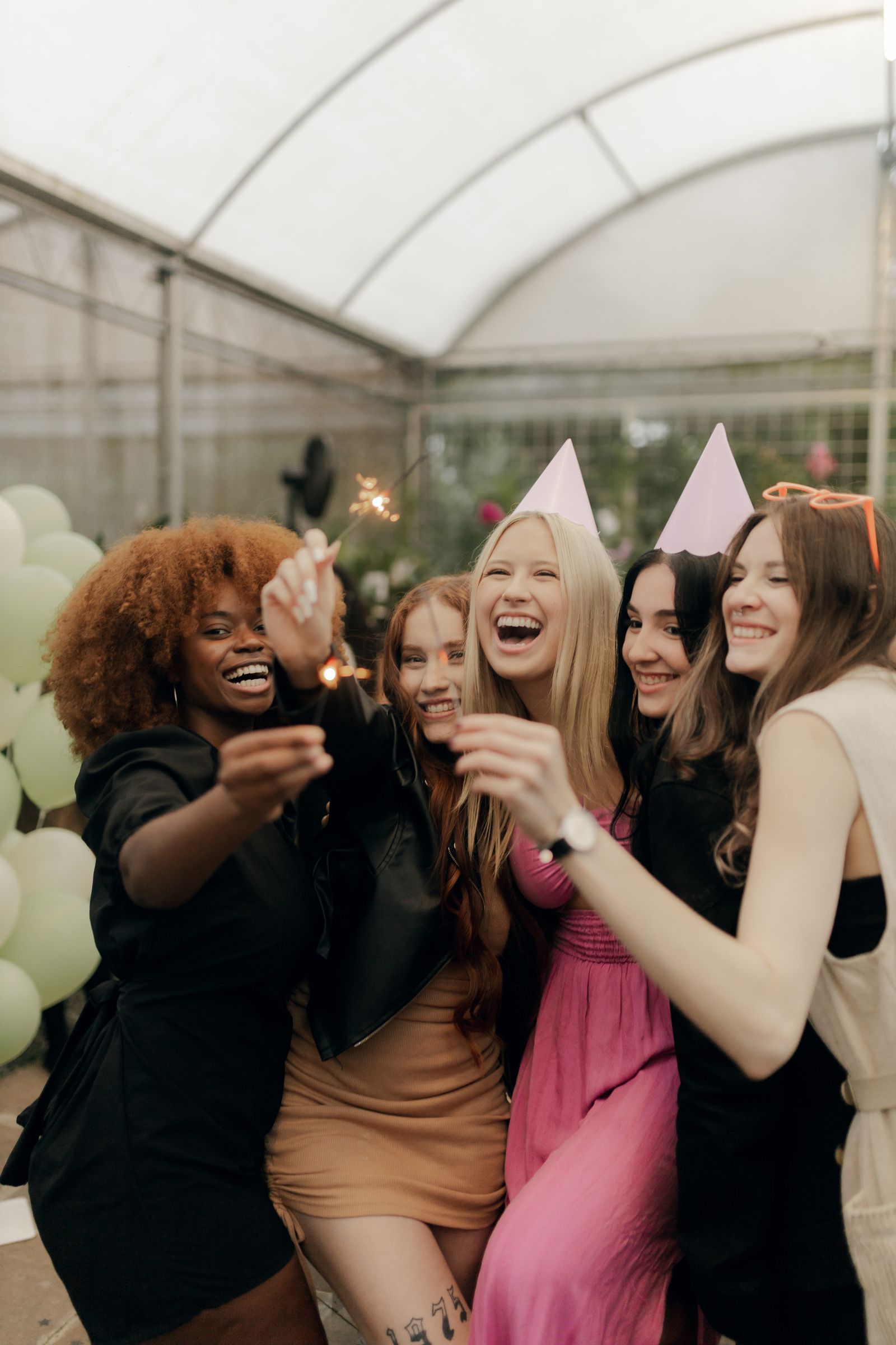 Group of friends celebrating at a party - party bus rentals New Jersey