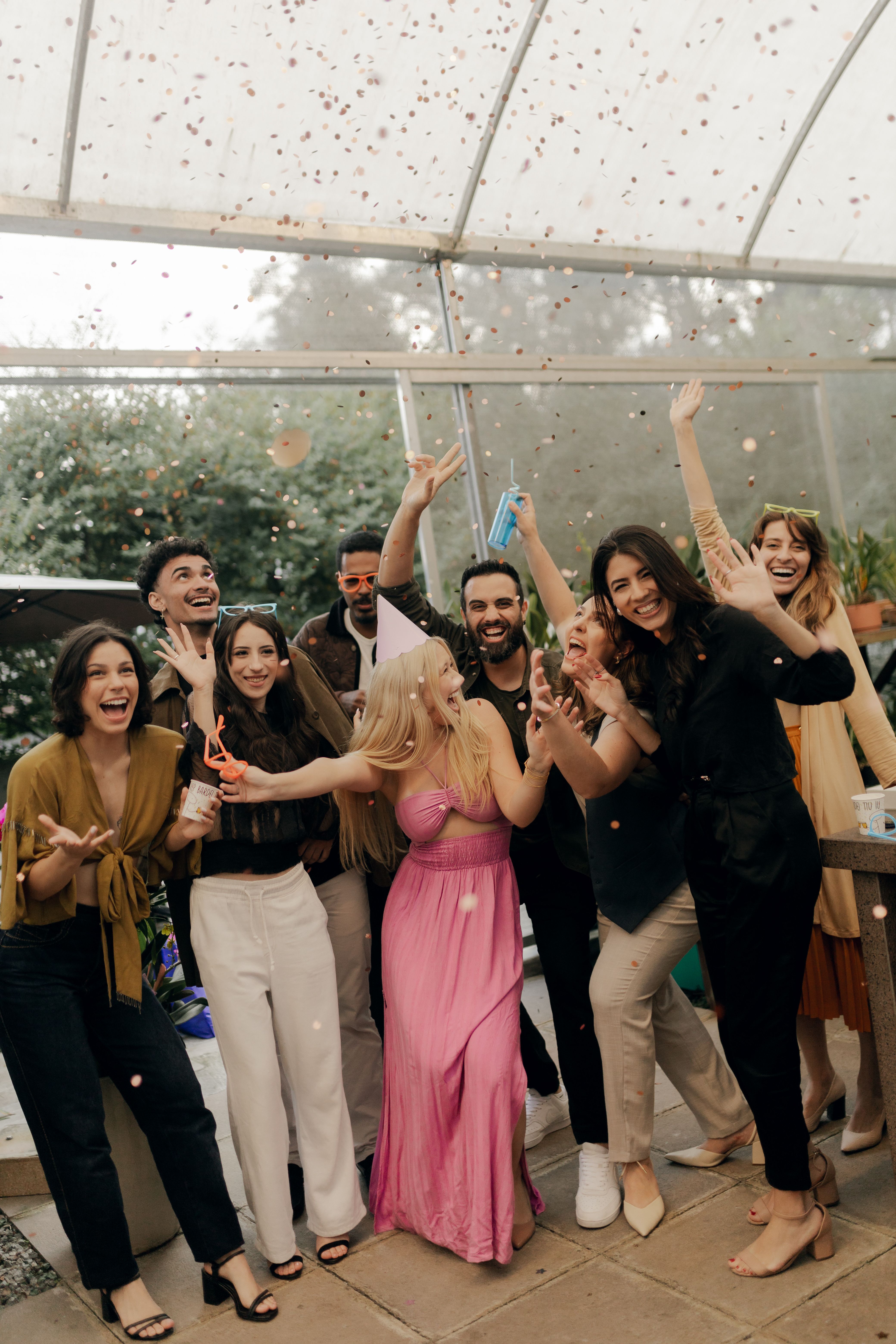 Joyful Indoor Party with Diverse Group Celebrating · Free Stock Photo