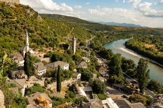 Aerial view of Berat city overlooking Osum River and historical architecture.