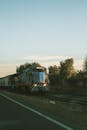 Scenic Freight Train on Rural Tracks at Dusk