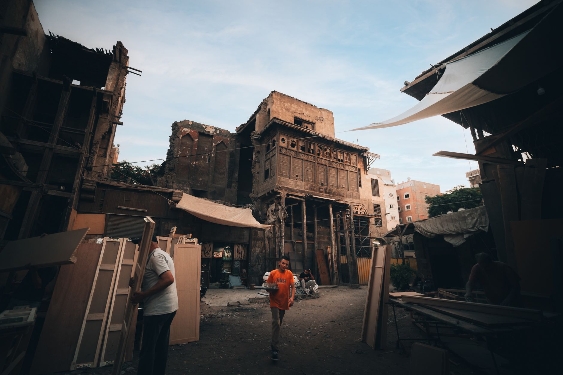 funday event ideas cairo — Explore a traditional woodworking workshop in Cairo, Egypt, set against an old building's backdrop