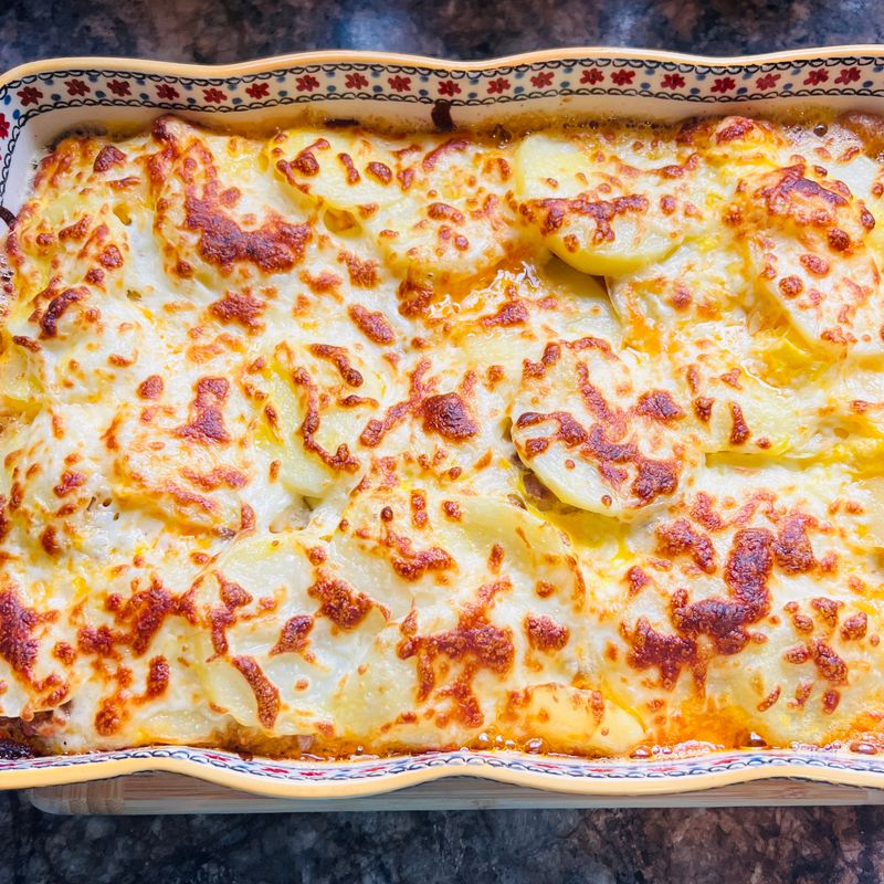 Cheesy Hashbrown Potato Casserole with Corn Flake Topping
