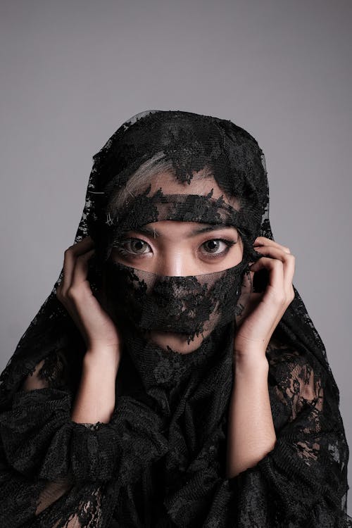 Free Woman Wearing Black Lace Hijab Stock Photo