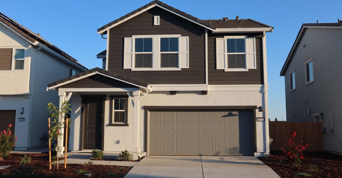 Newly constructed suburban house in Elk Grove, California, captured during daytime.