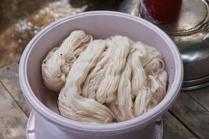 Undyed yarn coil by Tahir Xelfequliyev on Pexels