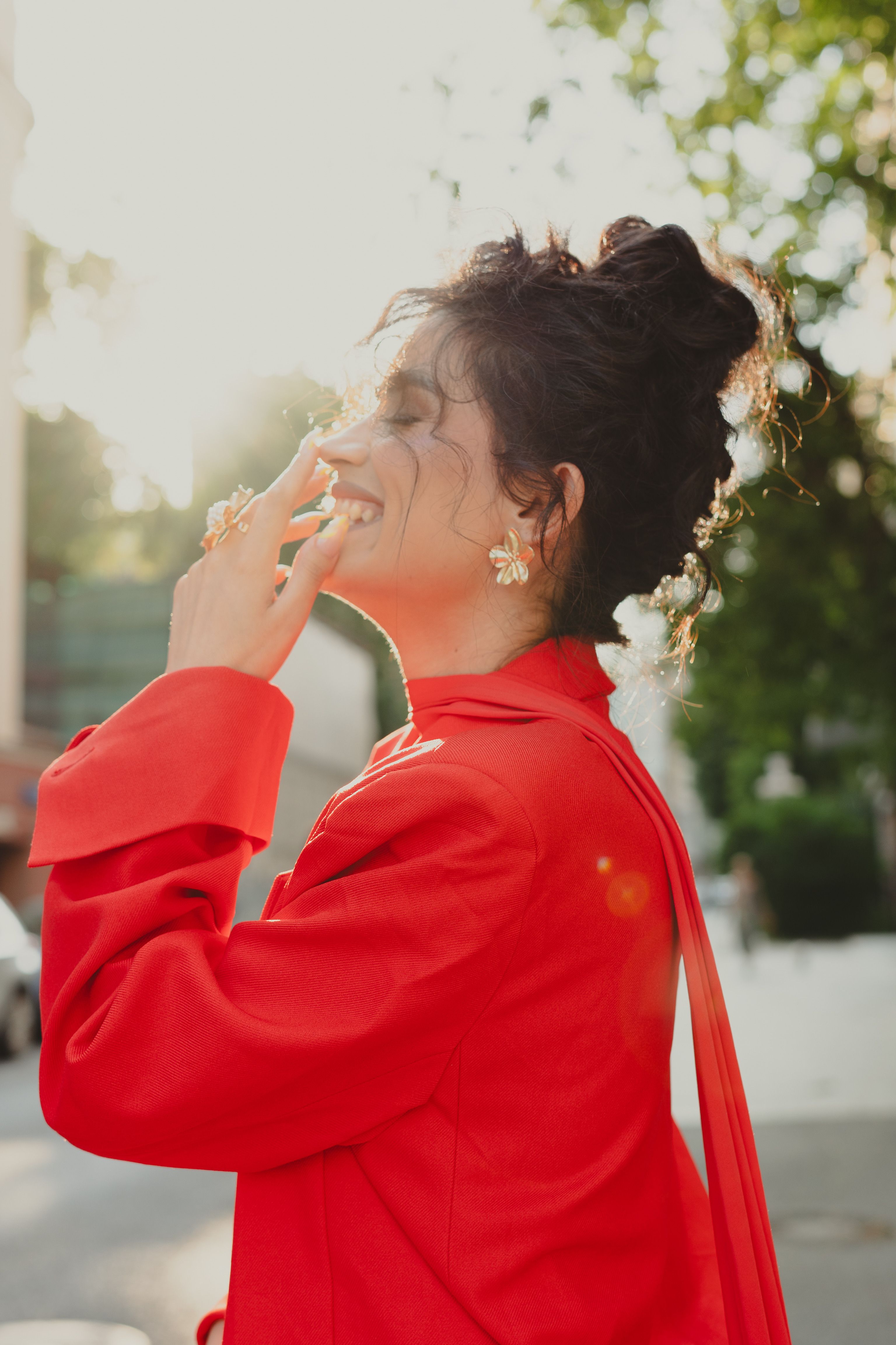 Woman in Red Dress Enjoying Sunlight Outdoors · Free Stock Photo