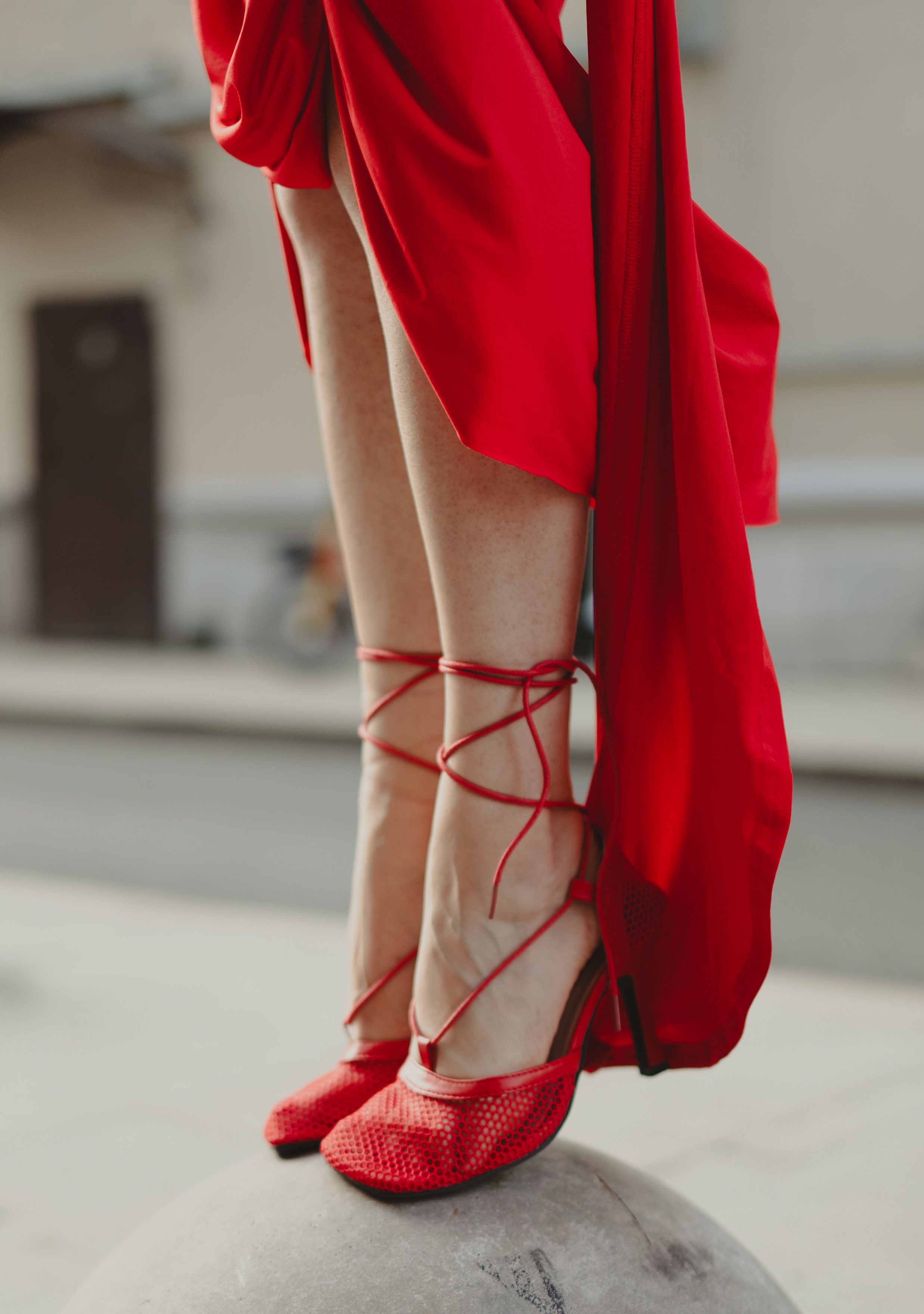 A Person in a Blue Dress and Red Shoes  Free Stock Photo