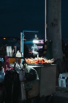 Explore vibrant night street food in Phnom Penh's lively scene.
