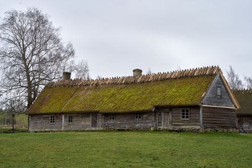 Free Charming moss-covered Nordic farmhouse at Fredriksdal Museum, Helsingborg, Sweden. Stock Photo
