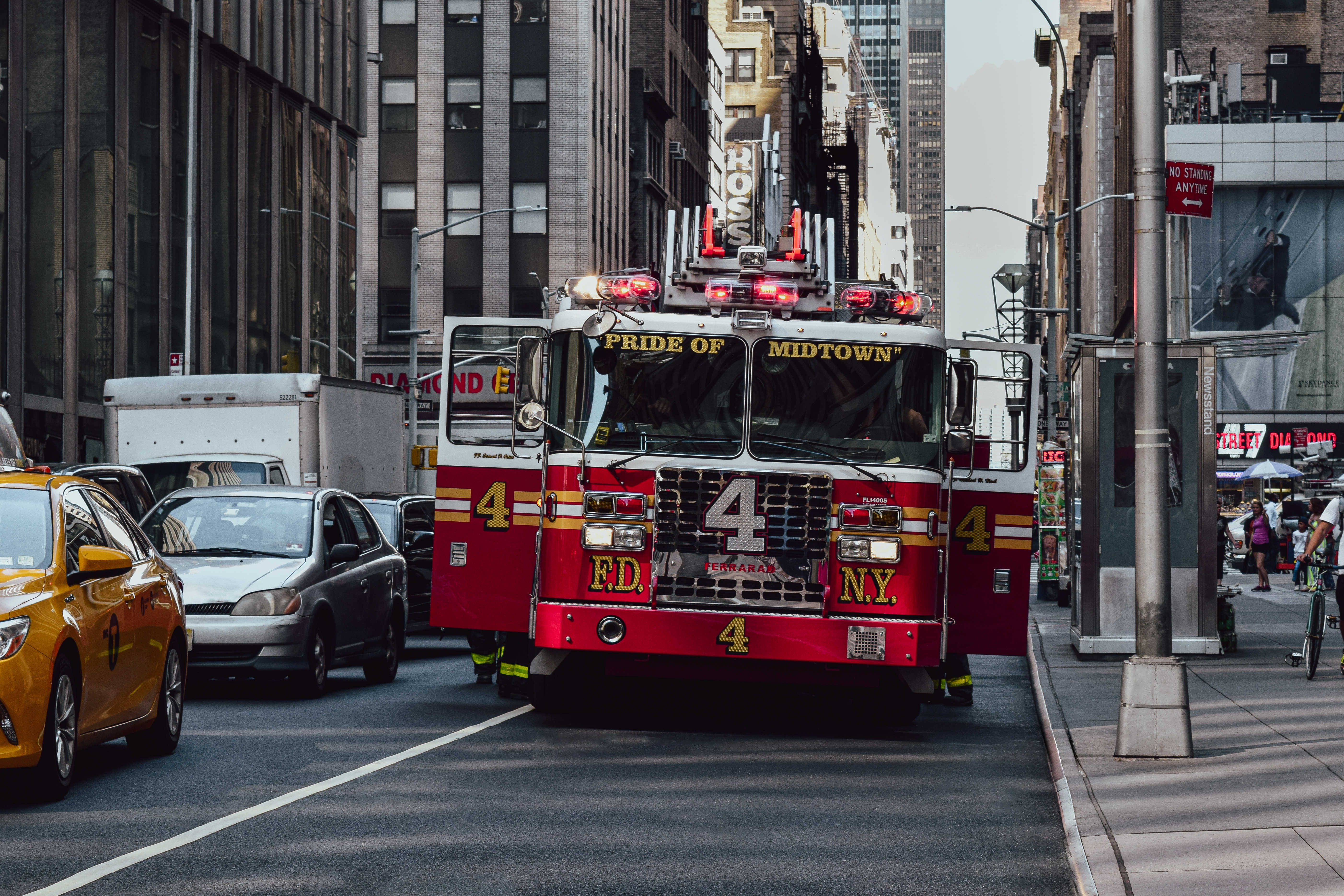 Fire truck responding to an emergency call in busy Midtown, NYC.
