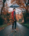 Free Photo Of Man Holding An Umbrella Stock Photo