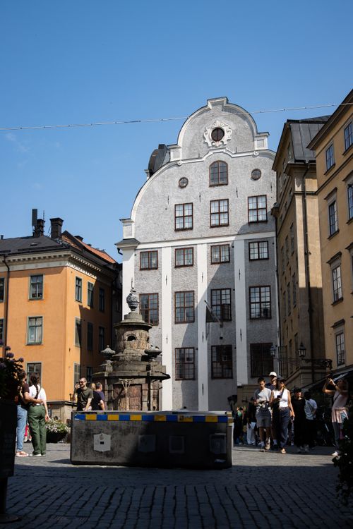 Free Charming street view of historic buildings in Stockholm's Gamla Stan, Sweden. Stock Photo