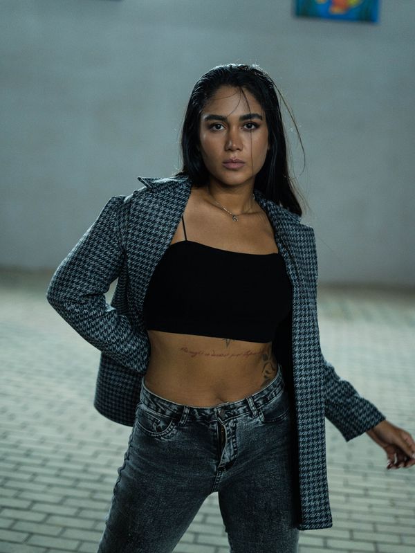 Houndstooth blazer with straight-leg jeans