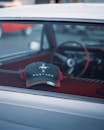 Retro Mustang Cap on Classic Car Dashboard