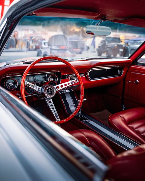 Free Beautiful vintage red interior of a classic car in İzmir, perfect showpiece for car enthusiasts. Stock Photo