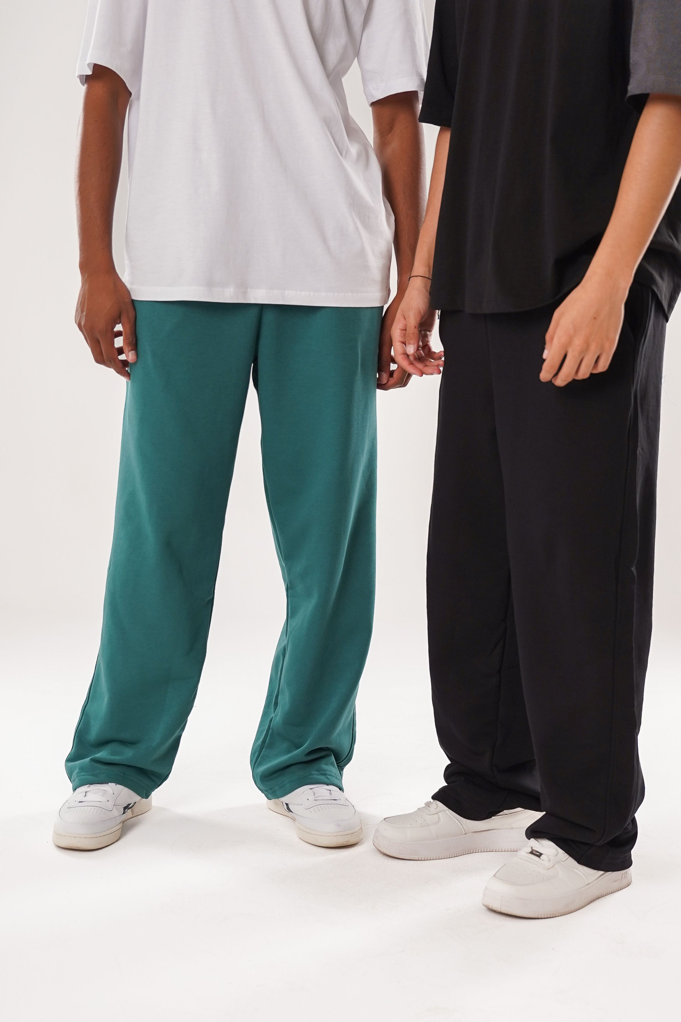 Casual Fashion: Two People in Comfortable Pants · Free Stock Photo