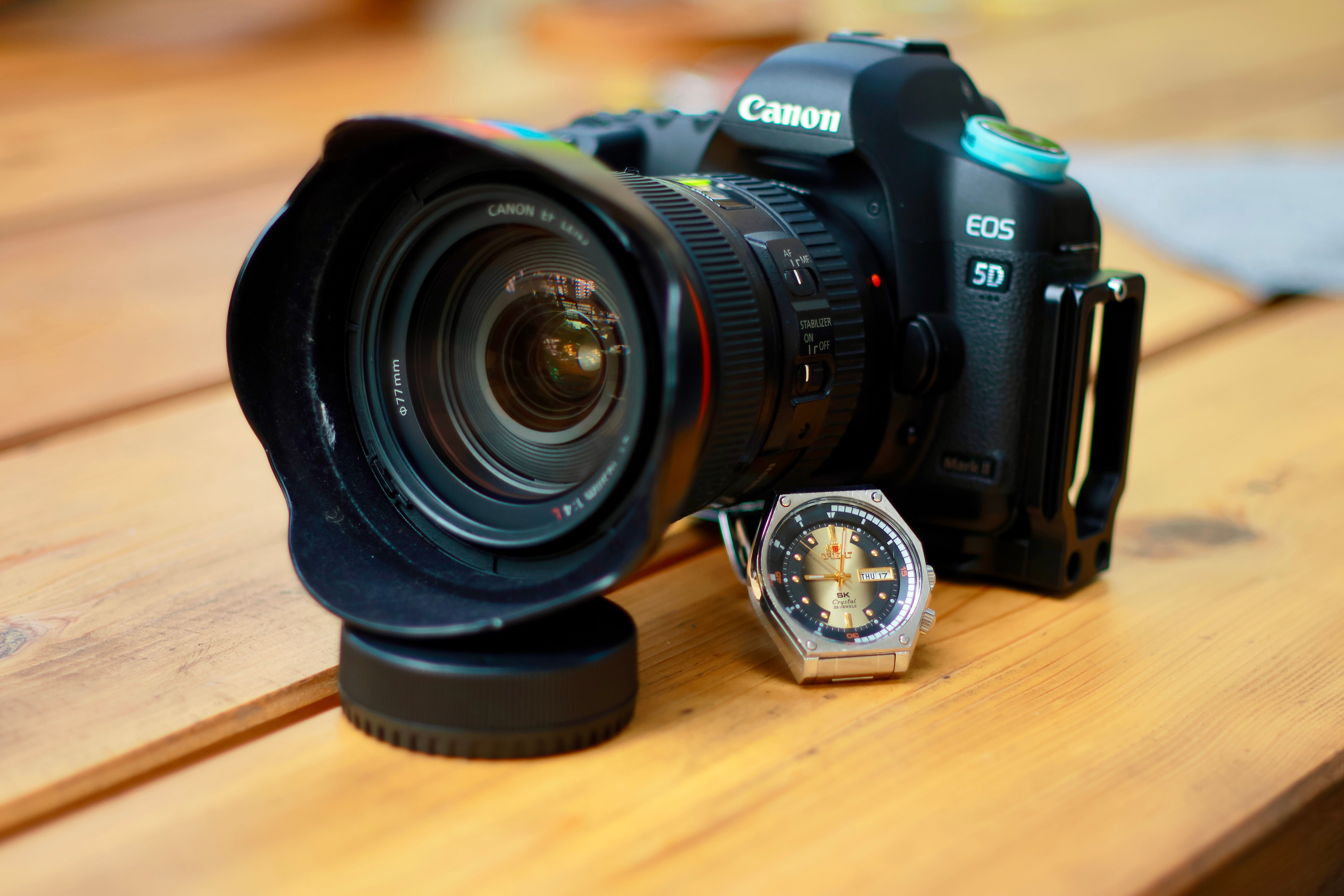 a dusty vintage digital watch on a wooden table